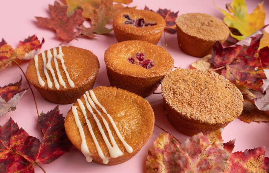 The Fall Box butter mochi pieces with autumn leaves on pink